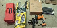 Group view showing spray gun, sanding kit, toolbox, mud pan