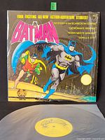Front cover showing Batman and Robin artwork and yellow-label vinyl record