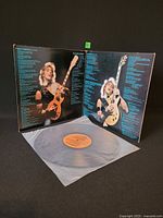 Open gatefold with vinyl and inner sleeve