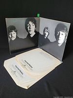 Gatefold opened showing interior portraits and included inner sleeves