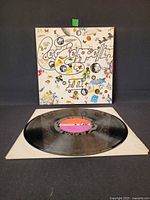 Front cover and vinyl on inner sleeve for overall view