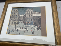Full view of framed lithograph in gilt frame