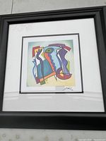 Full view of framed abstract lithograph showing artwork, mat and frame