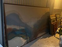 Front view of large framed abstract canvas