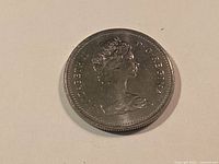 Obverse showing Queen Elizabeth II portrait, reeded edge visible