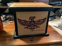 Front panel showing thunderbird design and artist signature