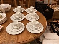 Full view of six place settings arranged on table