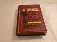 Front cover showing decorative red cloth design and title block