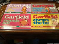 Front covers of all four Garfield books