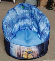 Front view showing Minions graphic and blue patterned upholstery