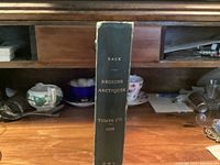 Spine showing title, author, tomes, year