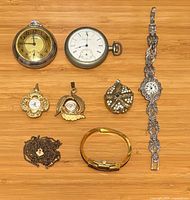 Front view of all eight items on bamboo surface