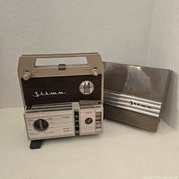 Front of Silma Duo projector and dust cover