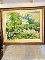 Full view of framed painting showing image, frame and mat