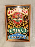 Front view of framed Asociación Amigos de la Cerveza poster