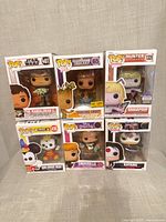 Front view of all six boxed Funko Pop! figures