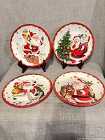 Front view of all four commemorative plates