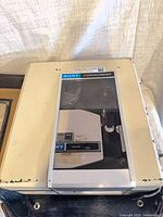 Top view of Sony-Matic Portable Videocorder showing clear window and tape reel