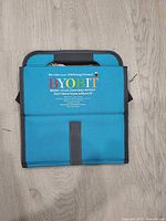 Front view folded showing BYO.BIT text