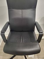 front view of black leather high-back office chair