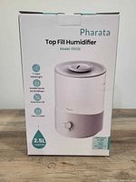 Front of sealed Pharata Top Fill Humidifier box showing product image and key features
