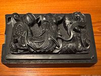 Closed ink stone showing carved dragon lid