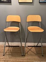 Front view of both folding bar stools