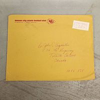 Yellow Chiefs mailing envelope with team letterhead and addressed front
