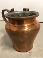 Full view of copper pot front
