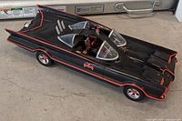 Front left perspective of Batmobile showing overall form and paint