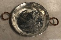 Top view showing hammered stainless interior and loop handles