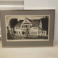 Front view of framed architectural sketch showing full artwork, mat and frame