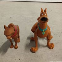 Front view of both figures standing