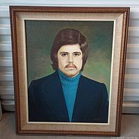 Frontal view of framed oil painting