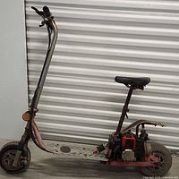 Full view of gas powered scooter left side