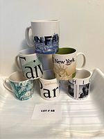 Front view of six Starbucks City Mugs displaying city graphics