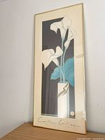 Full view of framed Calla Lilies print showing artwork, frame, mat and seal