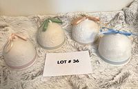 Front view of all four Lladró Four Seasons bells