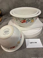 Three nesting Corelle Chutney stoneware bowls showing pattern and capacities