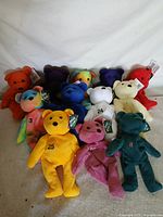 Group shot of all 12 plush bears