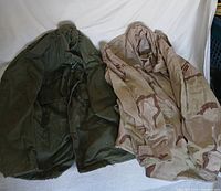 Both jackets laid out side by side