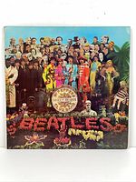 Front gatefold sleeve with Beatles collage cover
