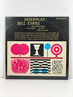 Front cover showing title, artist, artwork