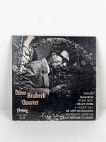 Front jacket with artist photo and track list