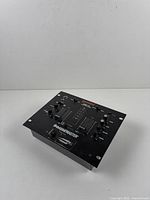 Angled top view of Gemini PMX-16 mixer showing overall condition