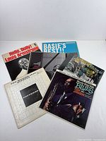 All six album jackets displayed fan-style