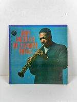 Front jacket with album title and artist