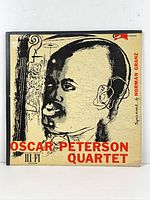 Front cover with artwork and title Oscar Peterson Quartet, Clef Records logo