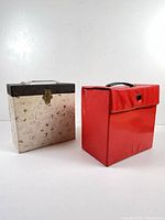 Two record cases closed, front view showing colour and style