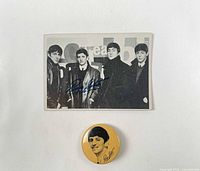 Front view of trading card and pin together